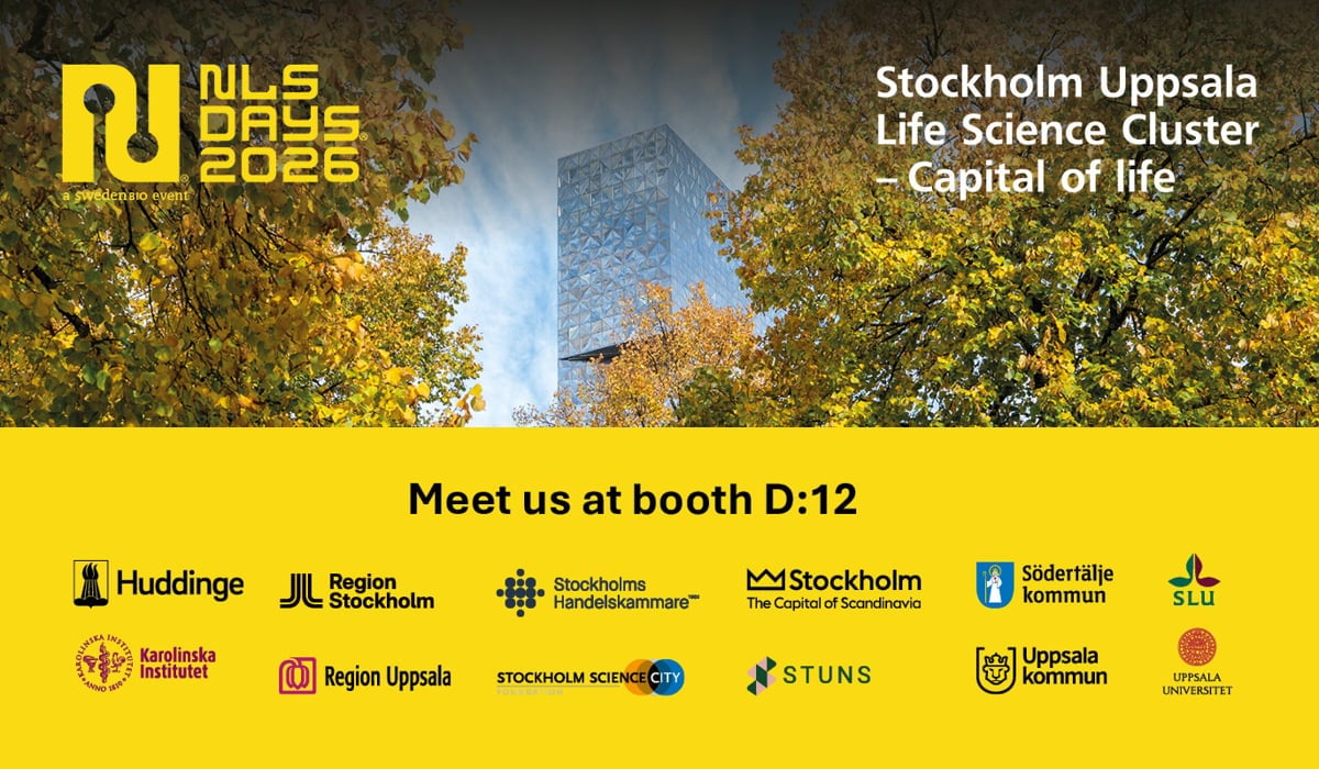 A yellow poster with a picture of a building in the background and the logos of the organisations in the booth.